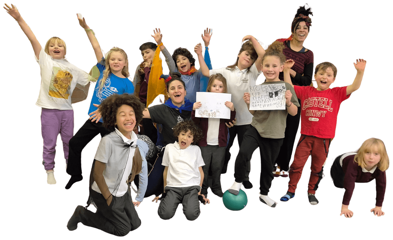 A smiling group of children and instructors celebrating at a Capoeira for All session
